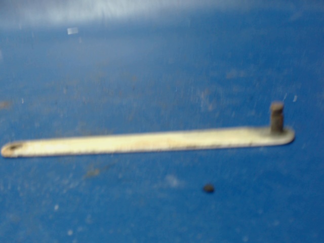 0413390-23 Cessna - Arm - Cabin Door Window